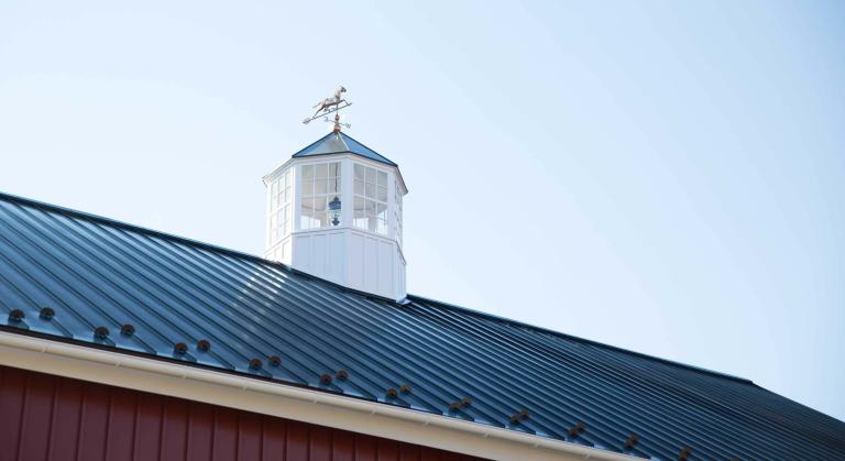 Metal barn roof with cupola