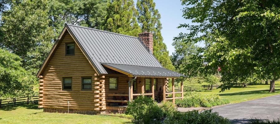 metal roofing contractor project - log home with a metal standing seam roof